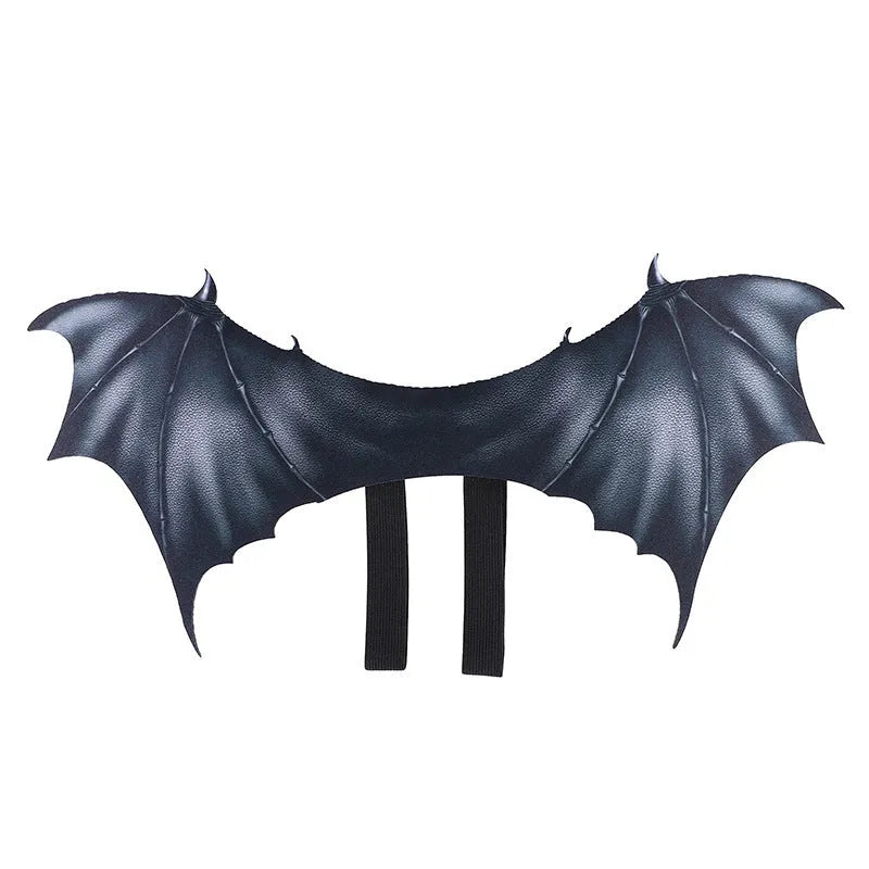 Black cloth bat wing costume for a cat or dog on a Halloween background.