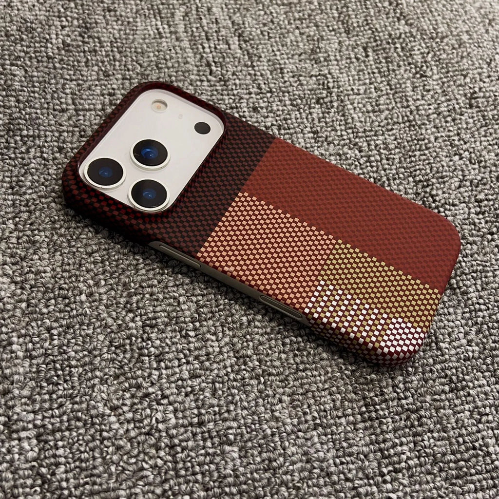 PC magnetic half-pack phone case for iPhone 17 Pro Max with plaid gradient design in Sunset Gold, on a flat surface