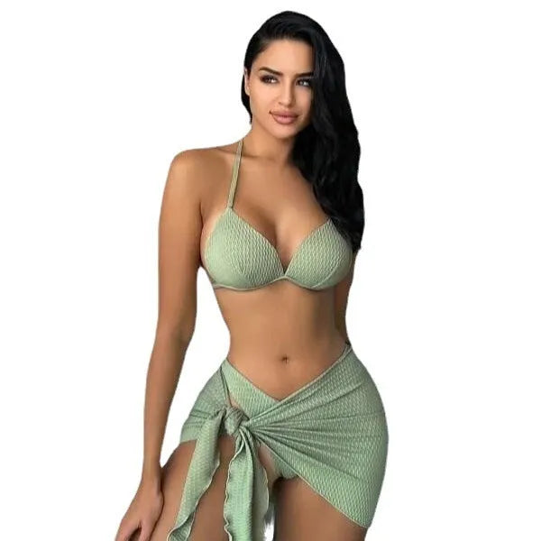 Women's avocado green Russian split three-piece swimsuit set showing halter neck top, high-waist bottoms, and skirt.
