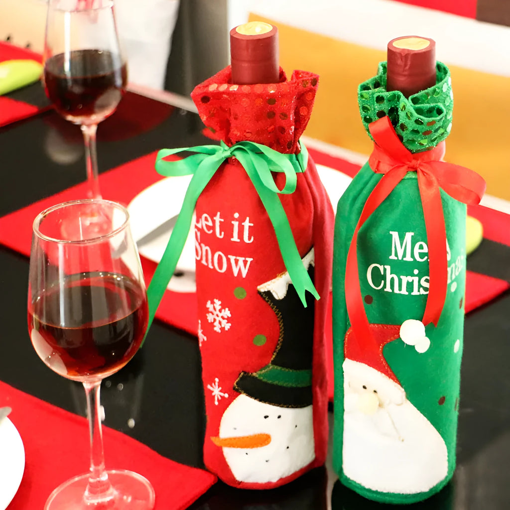 Red and green Christmas cloth wine bottle covers with festive designs on standard wine bottles
