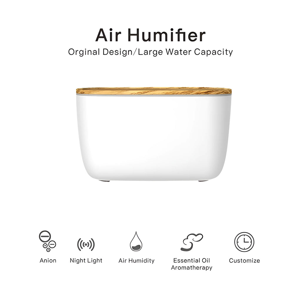 GX-22K white household aroma diffuser and humidifier with night light on a wooden table.
