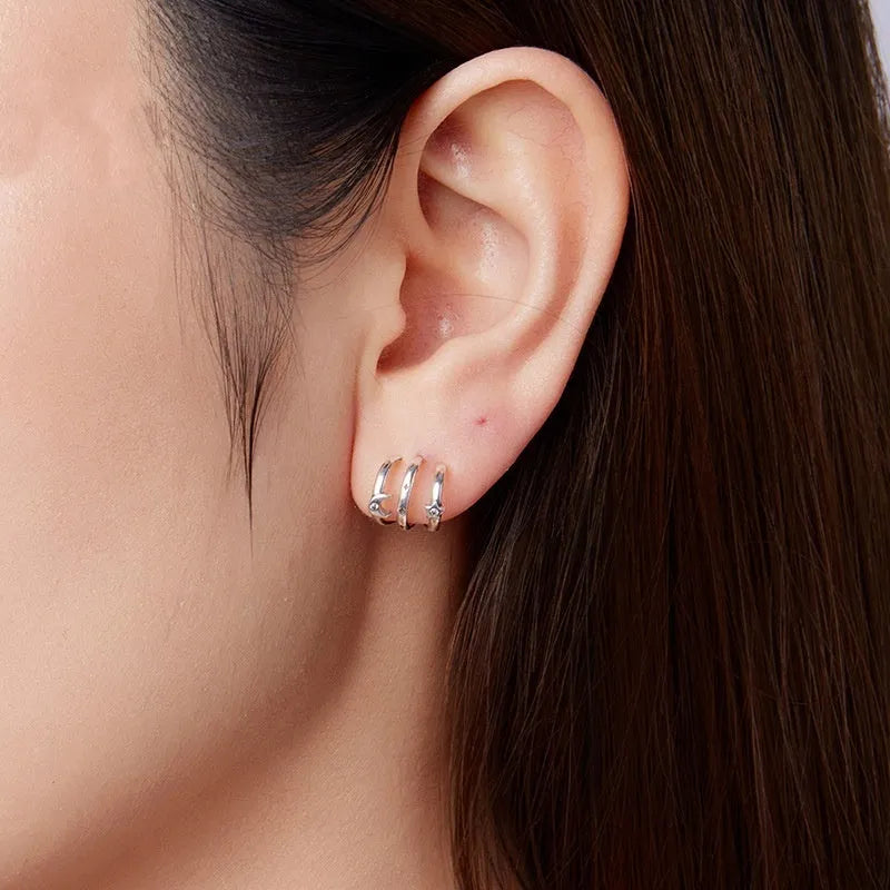 Multi-ring S925 sterling silver stud earrings with inlaid zircon, SCE1898 colour, on a clean background