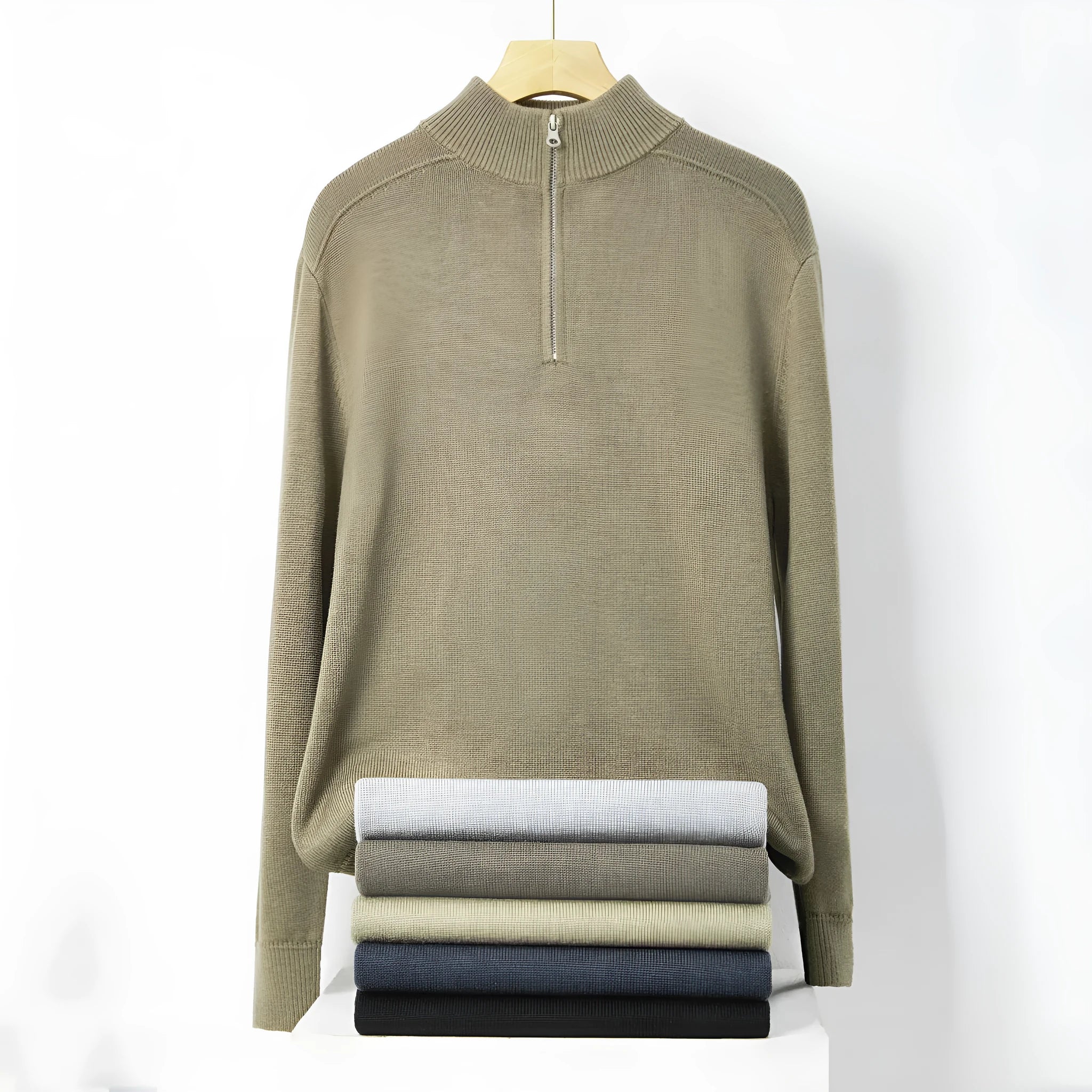 Man wearing a slim fit grey wool pullover sweater with long sleeves.