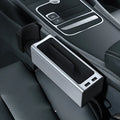 Baseus Zhizhen Metal Armrest Box Storage Box in black on a car seat armrest