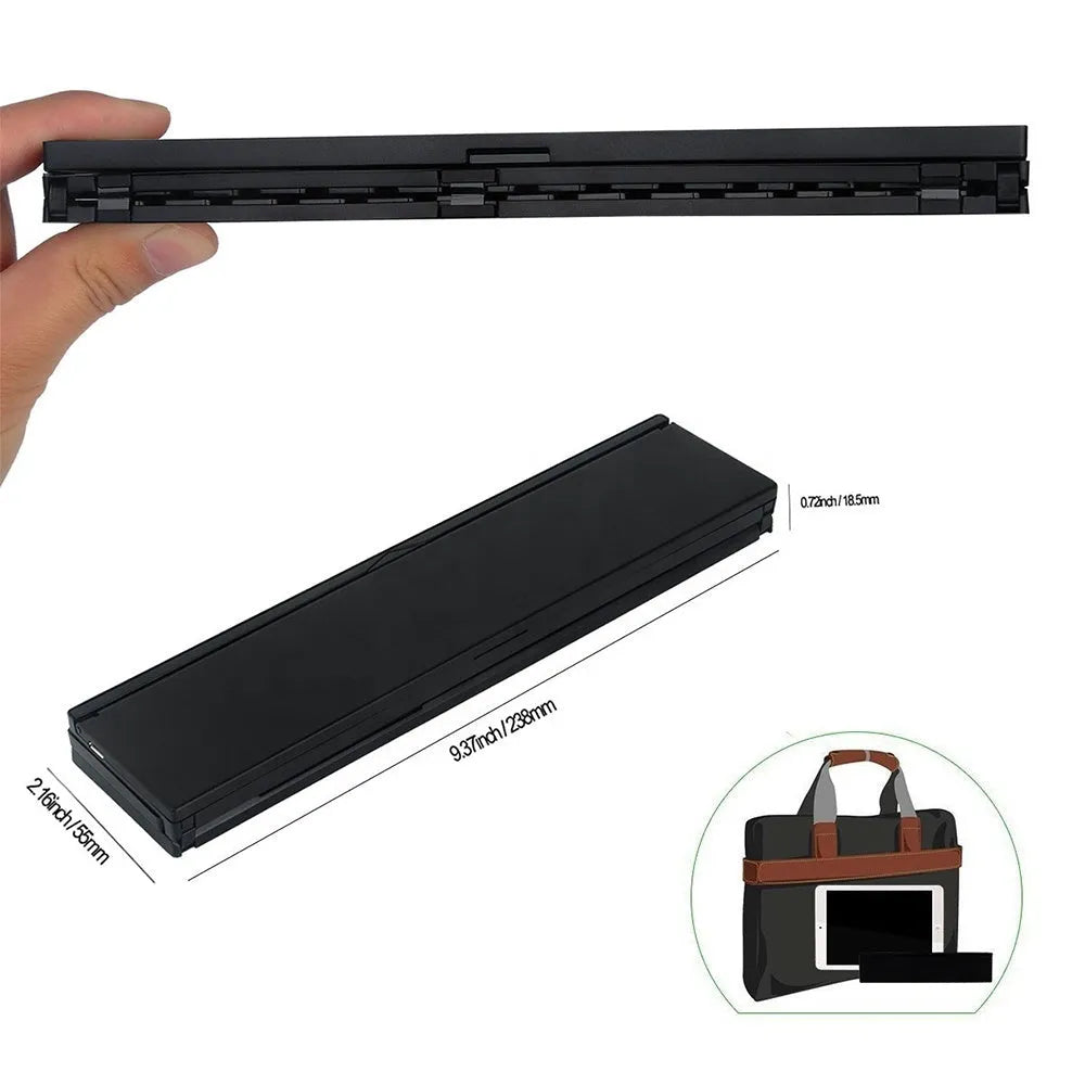 Black foldable Bluetooth keyboard for tablets with aluminium bottom and wrist support