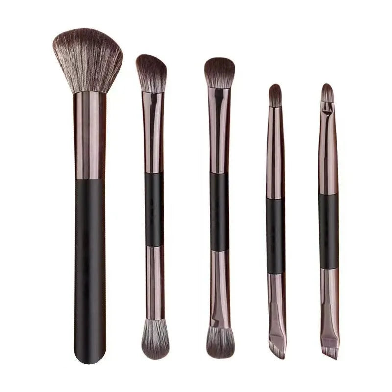 Portable makeup brush set with mirror showing silver or gold brushes with 2.6cm artificial fibre bristles