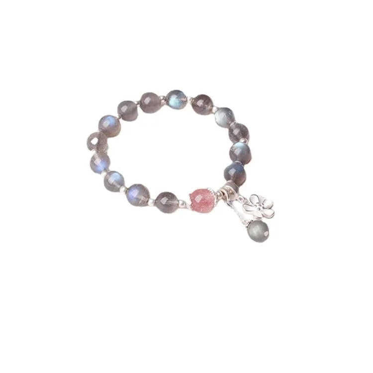 Grey moonlight crystal bracelet with Zodiac design, featuring 7.5mm moonlight lime and strawberry quartz stones on 925 silver.