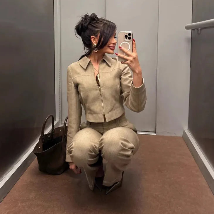 Women's herringbone pattern two-piece suit with embroidered jacket and straight-leg trousers
