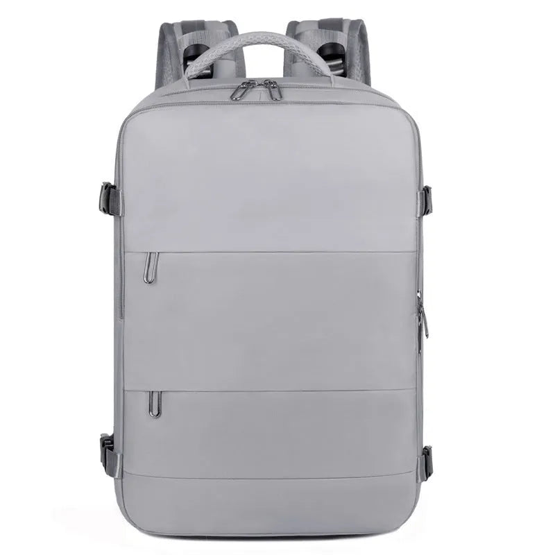 Large grey travel backpack with multiple pockets and an air pillow belt, shown open to reveal internal organisation.