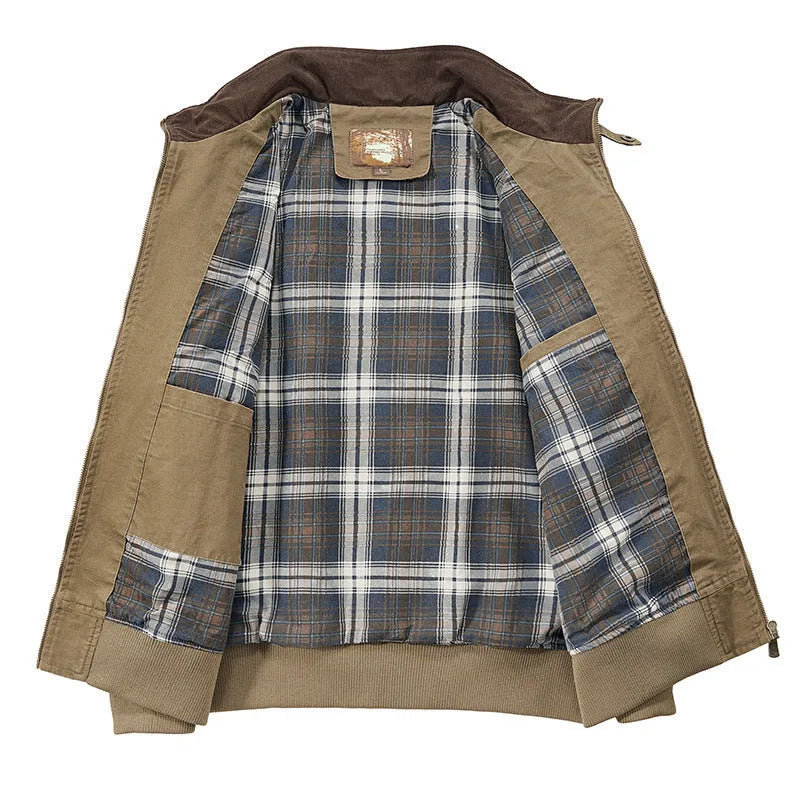 Men's camel coloured washed cotton baseball-style flight jacket on a hanger
