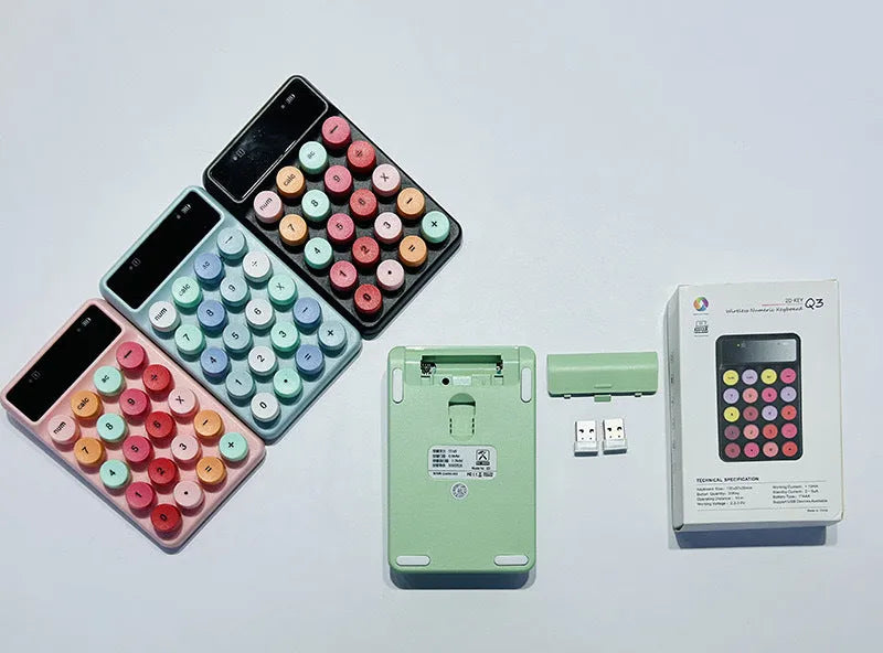 Mini portable wireless keyboard showing macaron colour options on ABS plastic construction