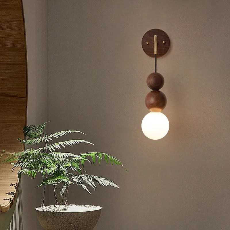 Wood and copper wall lamp with suspension wire and tri-colour light, 10cm diameter