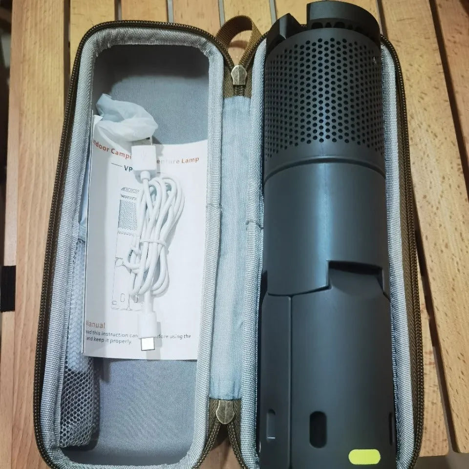 Portable creamy white and dark grey LED camping lantern with push button.