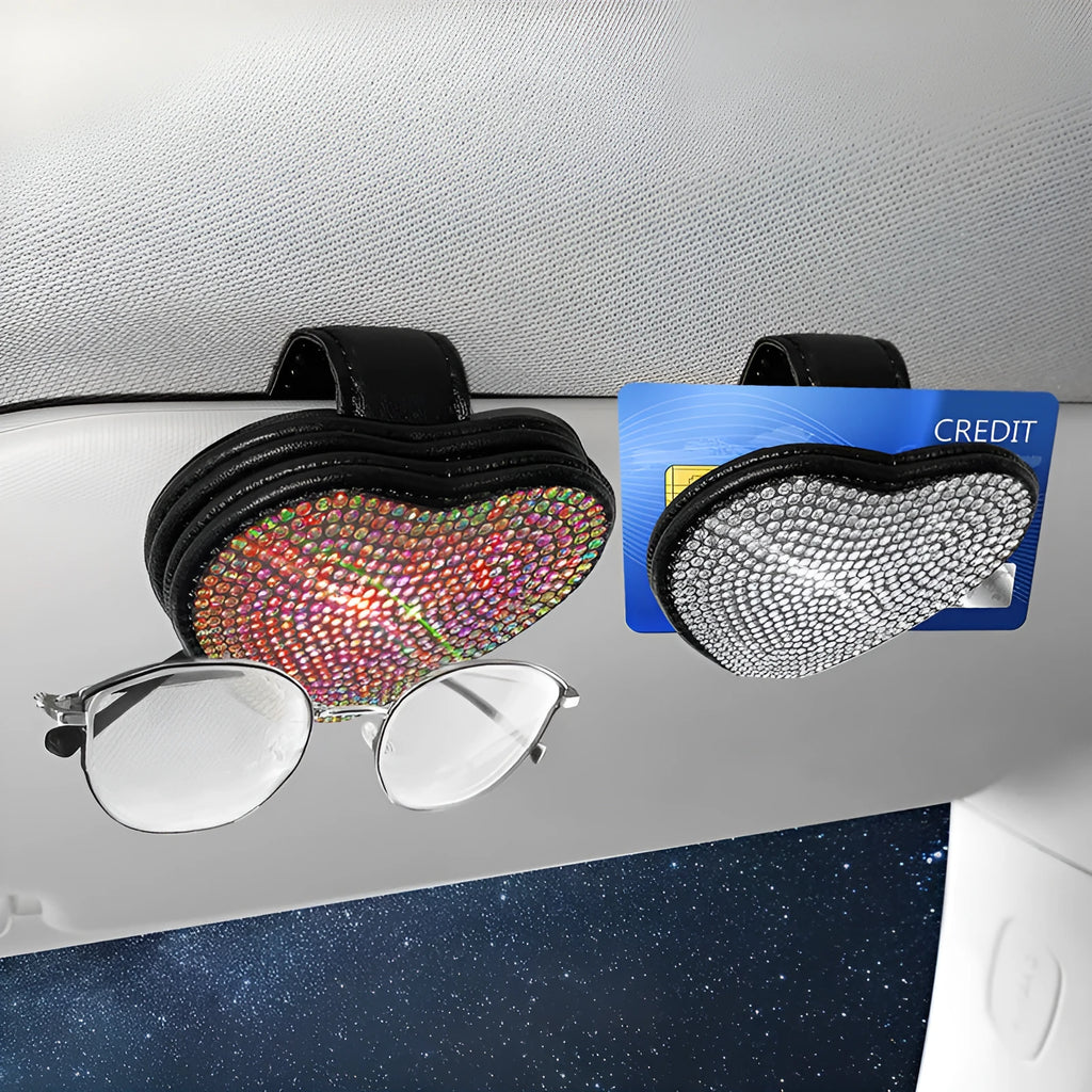 Black diamond-encrusted PU leather car sun visor clip holding sunglasses and a ticket.