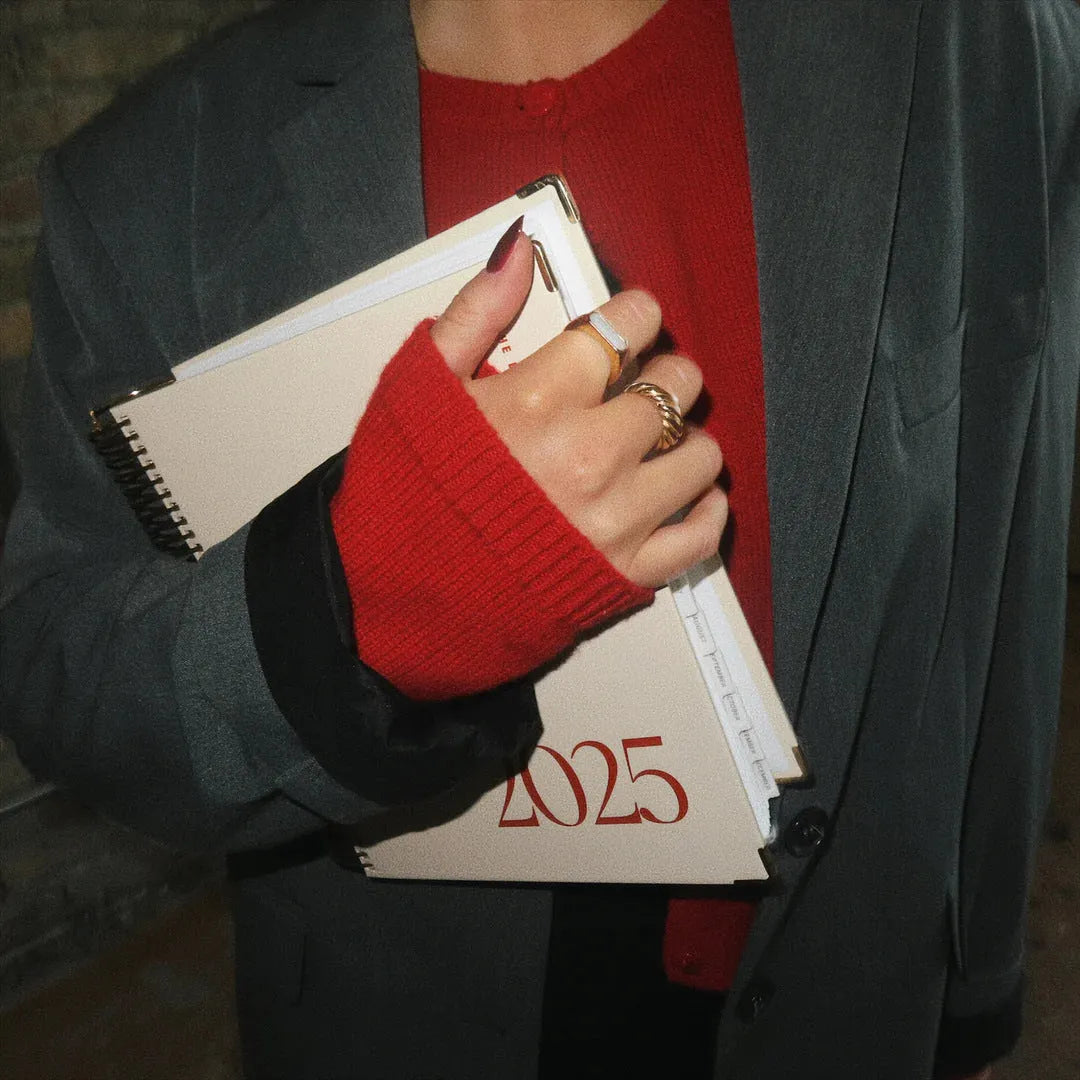 Cherry red coil notebook with ring binding for daily schedules