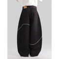 Black straight-leg men's trousers with a mid-waist and zip fly on a hanger.