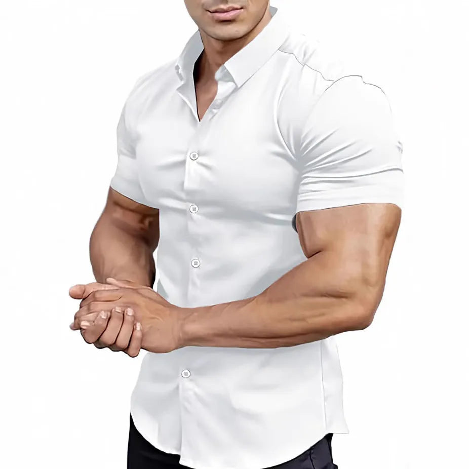 Man wearing a brown short sleeve casual printed shirt with a collar.