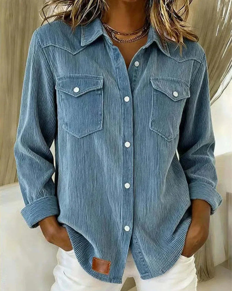 Women's light blue distressed denim cardigan jacket on a flat lay, showing long sleeves and solid colour