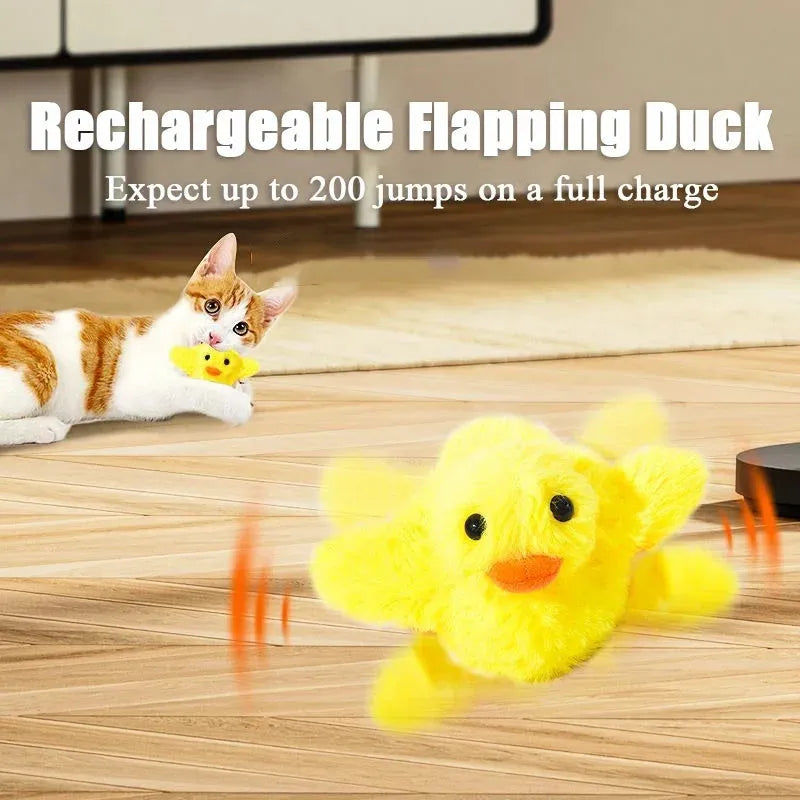 Yellow polyester plush duck-shaped electronic cat toy with USB charging cable.