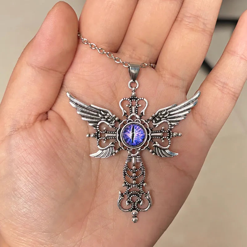 Alloy devil wings and cross geometric pendant necklace on a chain in blue, green, purple, red, and yellow colour options.