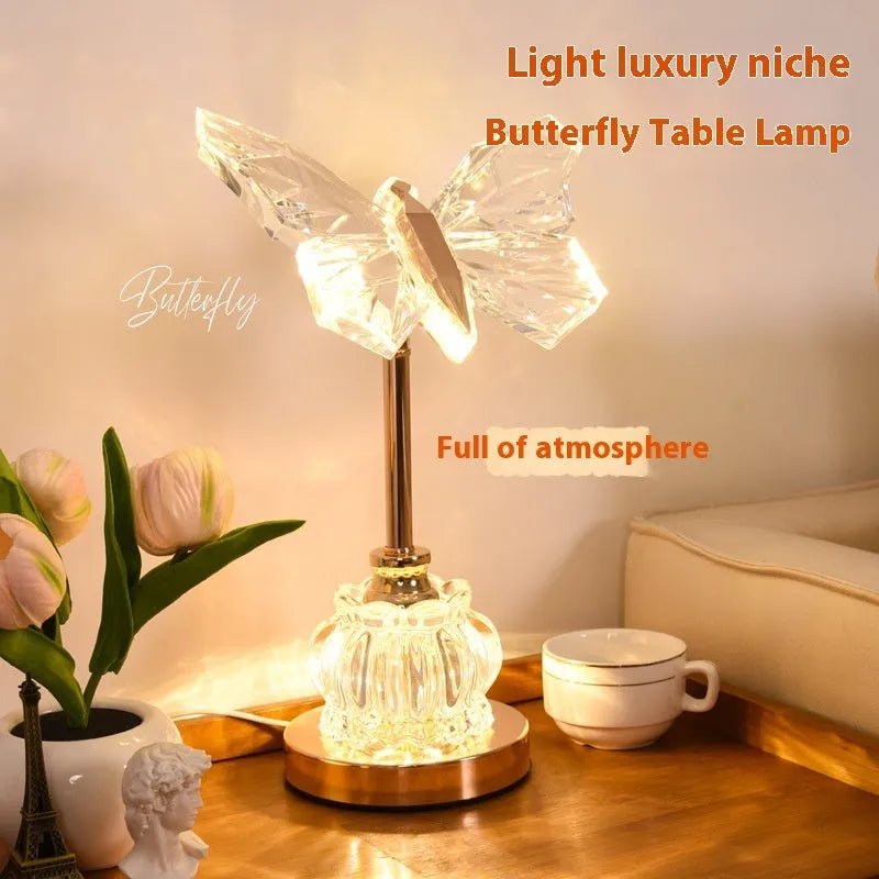 Butterfly table lamp with adjustable brightness and angle in a bedroom setting with USB plug-in