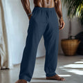 Straight-leg cotton and linen casual trousers in a light green colour, shown with visible pockets.