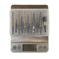 Silver 12-piece hexagonal handle screw extractor set on grey background