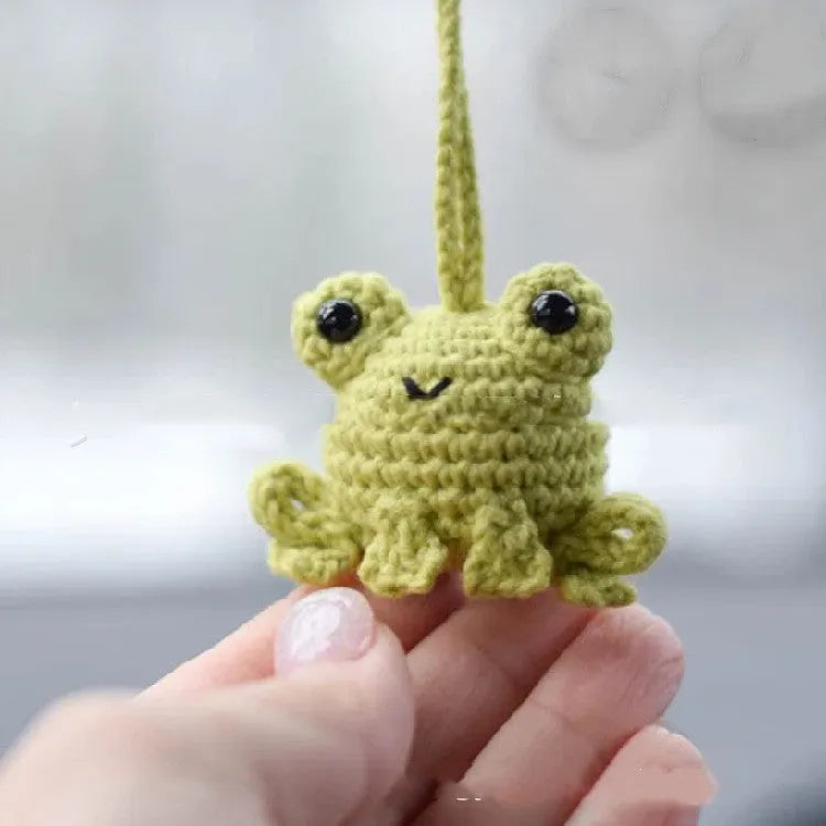 Handmade woven plush frog car pendant showing green colour option with 5cm width measurement