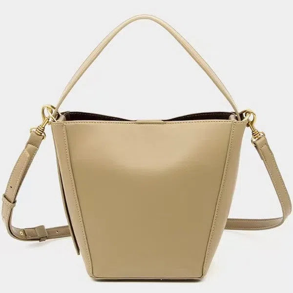 New Springsummer urban minimalist crossbody shoulder bag bucket style in black PU with front pocket