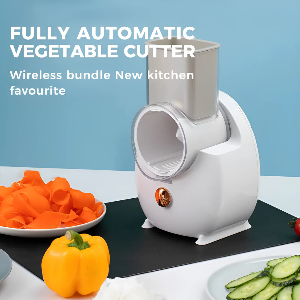 White electric vegetable slicer with suction base and multiple blades for potatoes and carrots