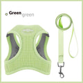 Brown waffle cloth cat harness chest strap showing adjustable sizing and hand holding rope attachment