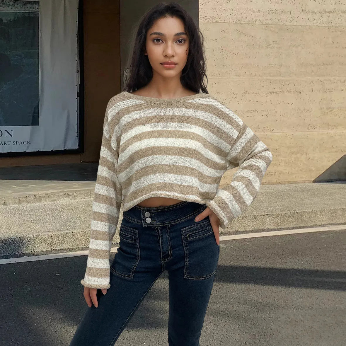 Long-sleeved striped pullover sweater in mercerised cotton shown in multiple colours.