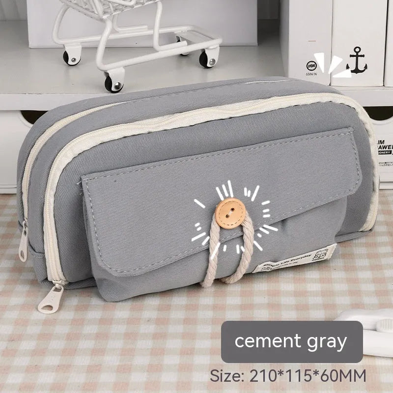 Korean-style canvas pencil case in green, beige, blue, and grey colours with large capacity for pens