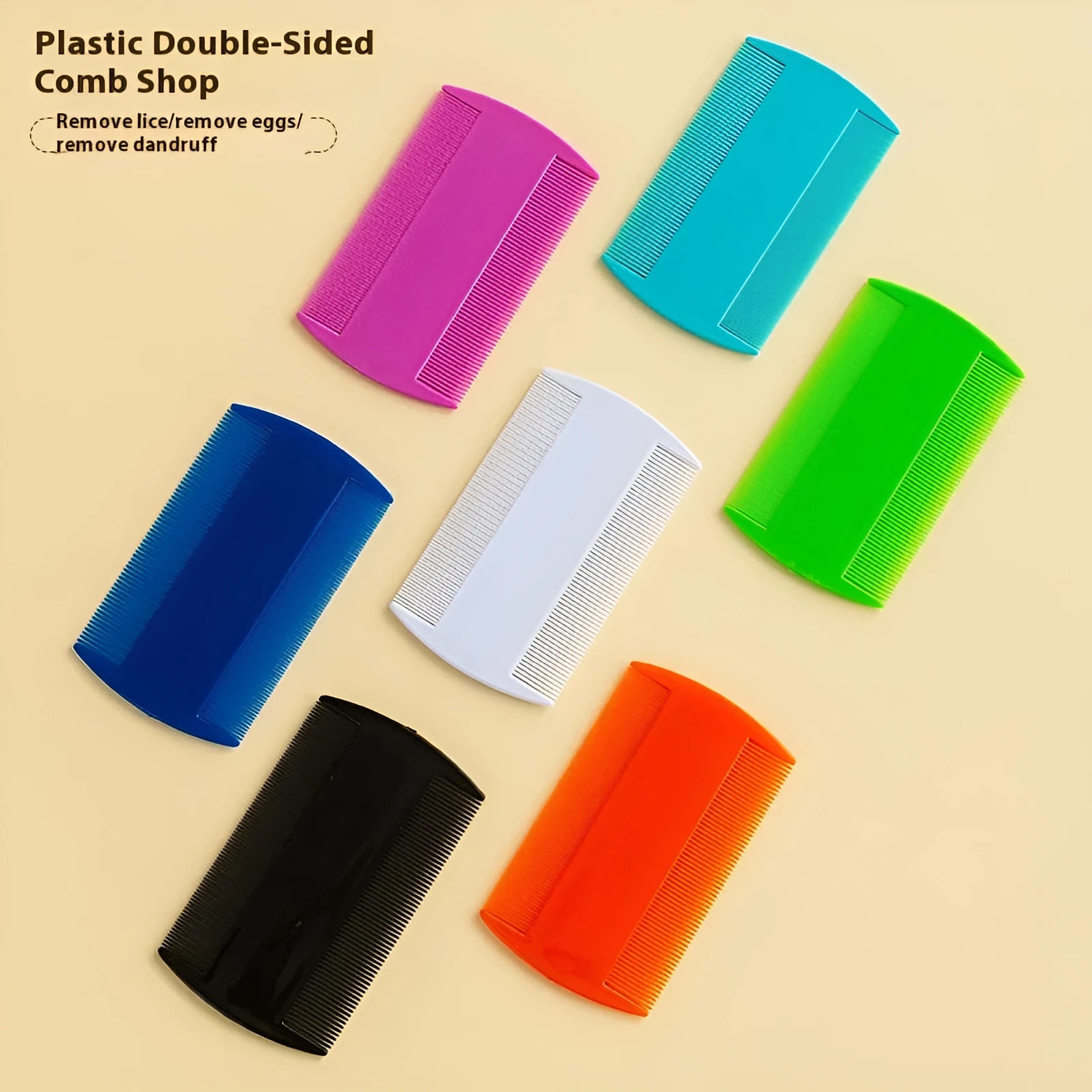 Double-edged fine-toothed plastic comb in assorted colours on a white background.