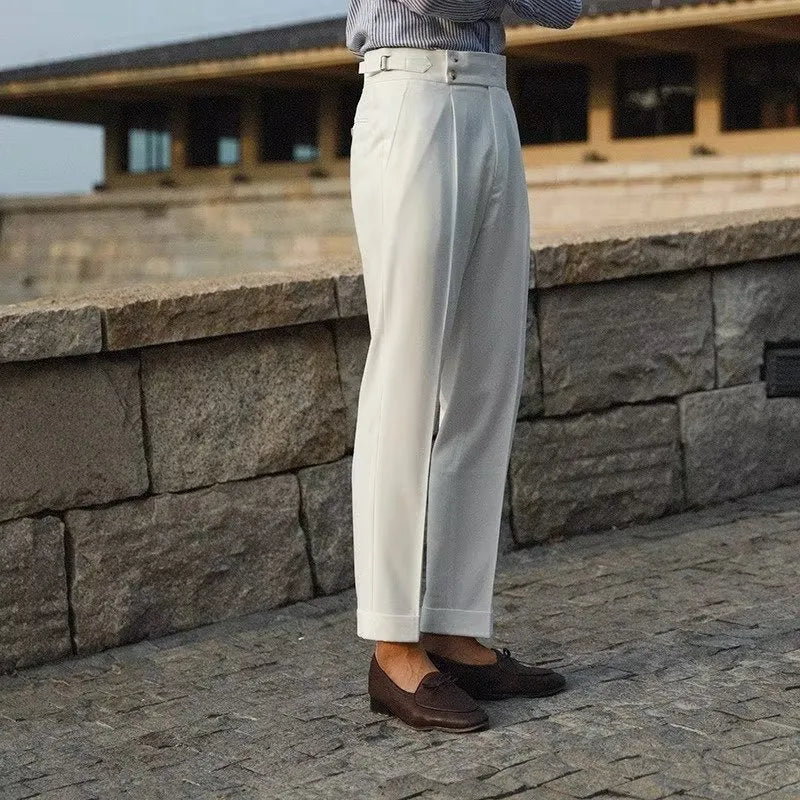 Slim fit straight cut formal suit trousers in apricot, black, and white colours.