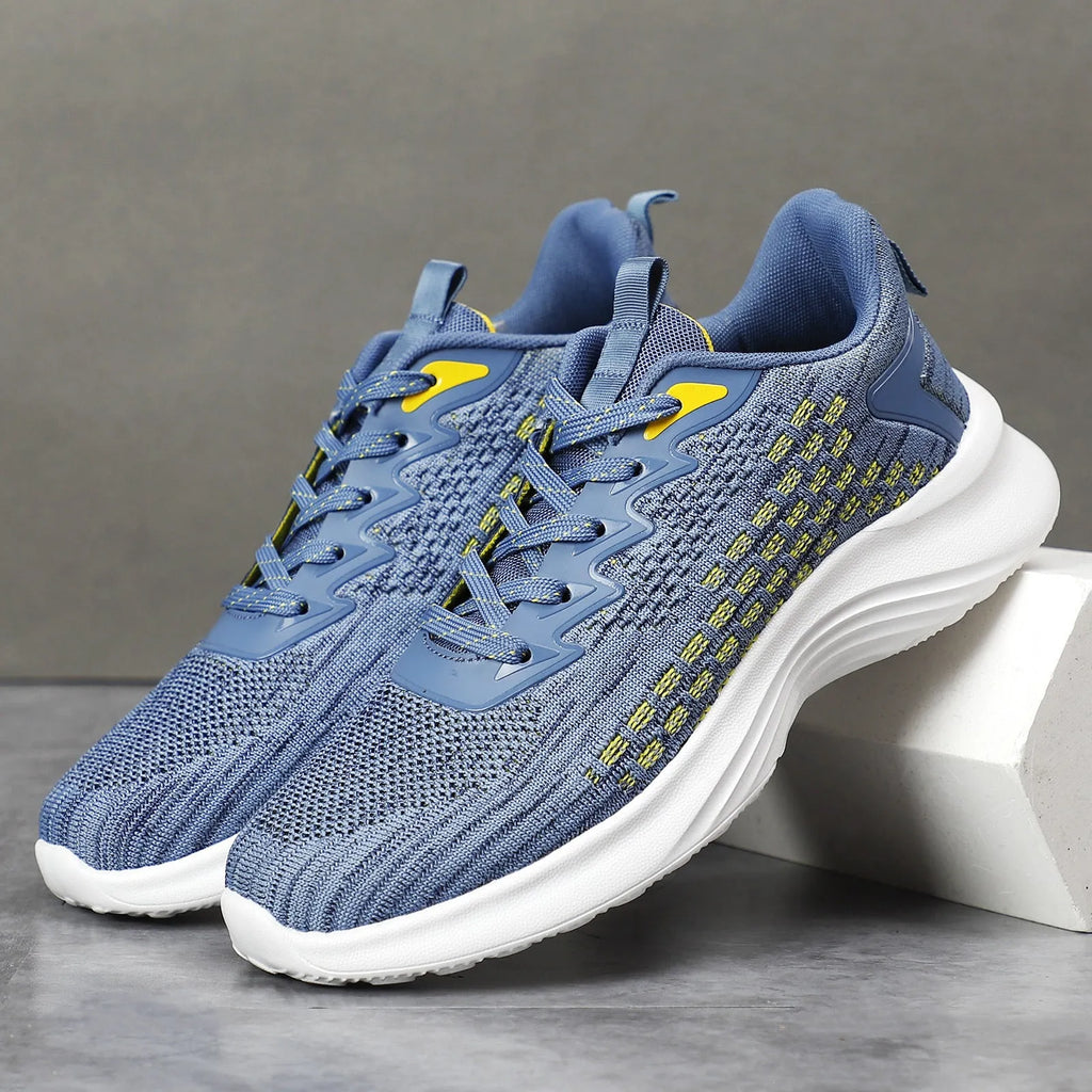 Women's lavender purple Flyknit running shoes with mesh lining and striped pattern on a white background.