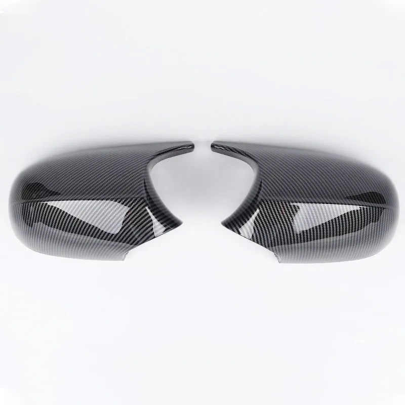 Pair of black ABS plastic rearview mirror shells for BMW 3 Series E90 door mirrors.