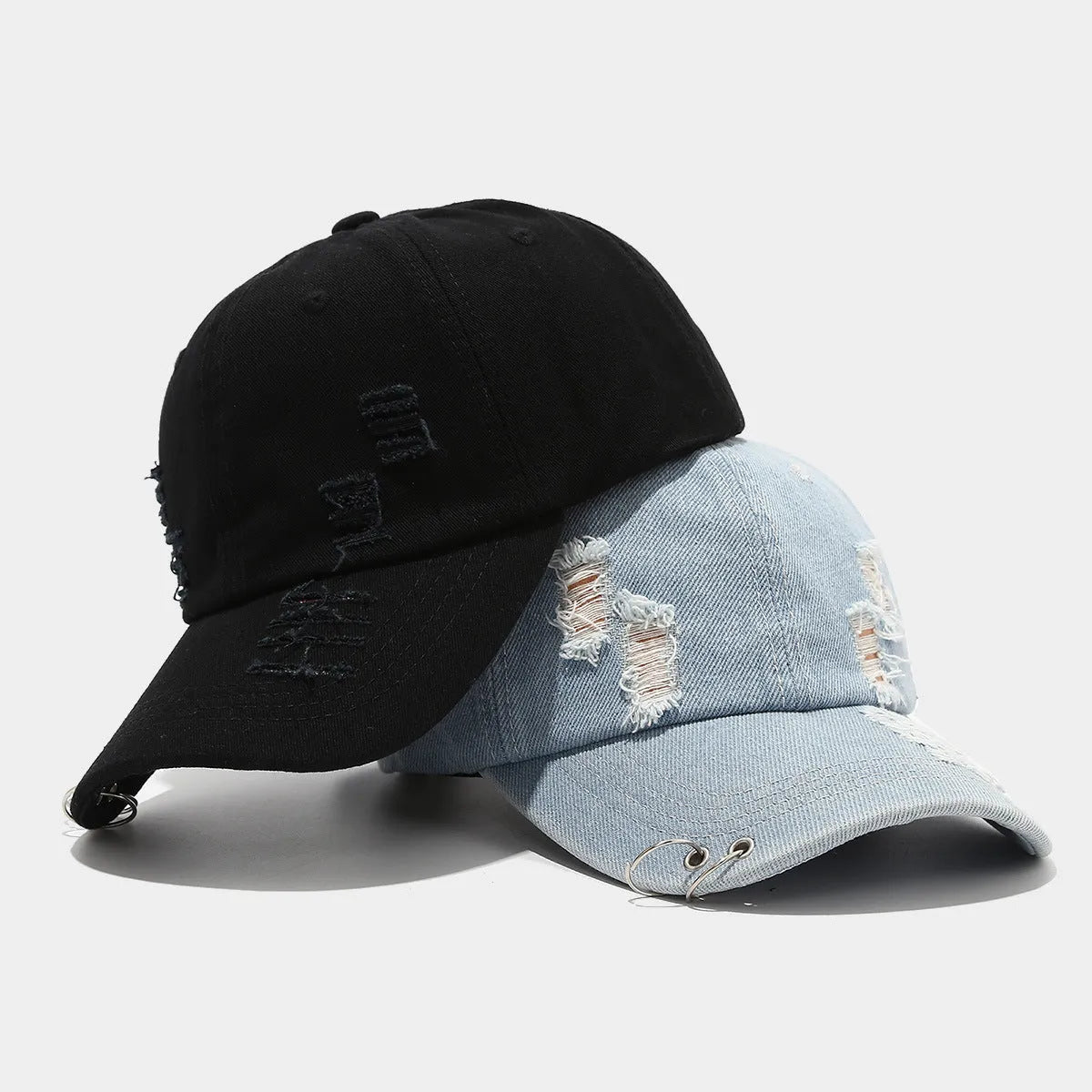 Men's adjustable denim peaked cap in black, white, and light blue jeans colours with dome crown
