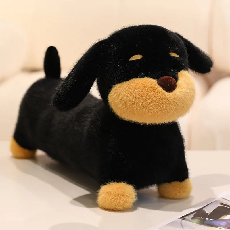 Cute plush sausage dog toy in brown European mink velvet on a light background