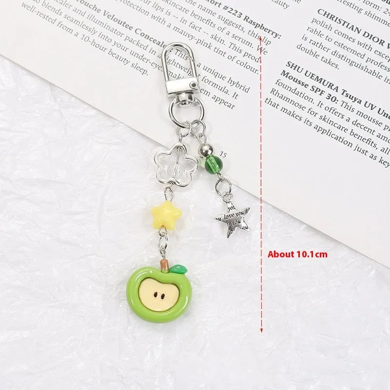 Fruit-themed mobile phone bag pendant keychain with resin apple and strawberry designs