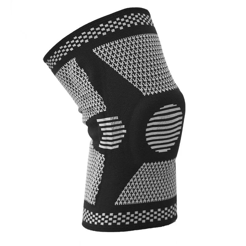Silicone spring sports knee pad in polyamide, shown in blue, on a leg.