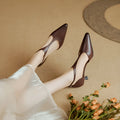 Women's cowhide leather high heels with pointed toe in black or brown colour
