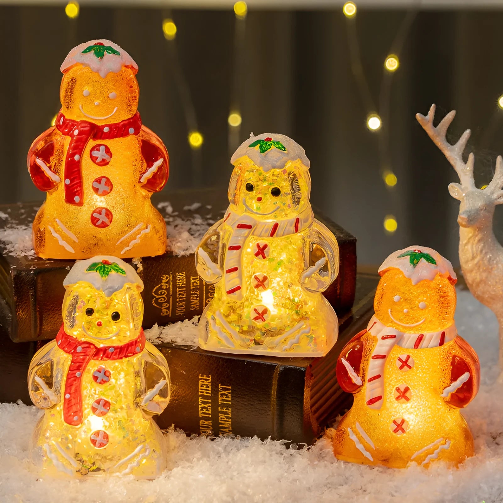 Glowing Christmas gingerbread man snowman ornament in plastic with four colour variations including clear, white and red scarf options
