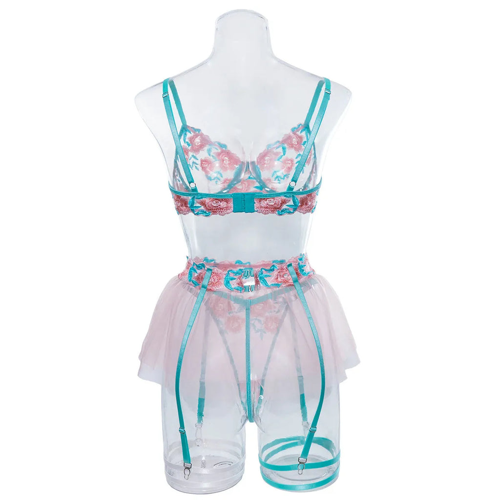 Women wearing pink embroidered mesh pettiskirt suit with matching top and skirt