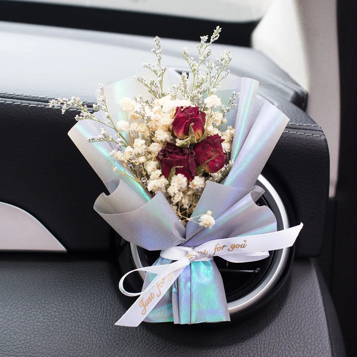 Handmade dried flower car air freshener ornament in multiple colours mounted on car vent