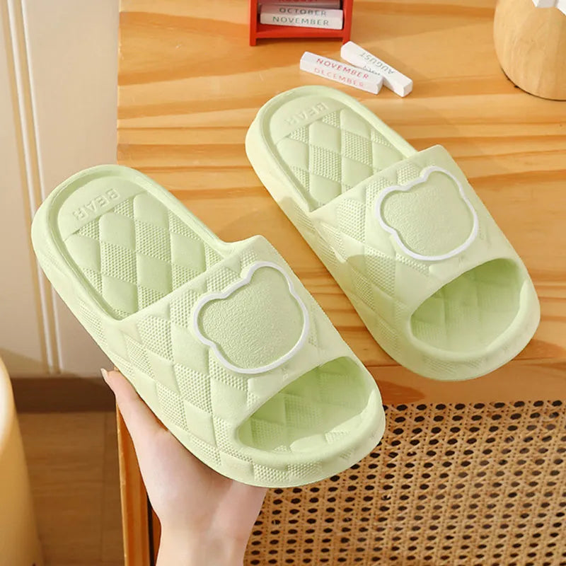 Rhombus design bear slippers in EVA with non-slip thick sole, shown in black, green, grey, khaki, pink, white, and yellow.