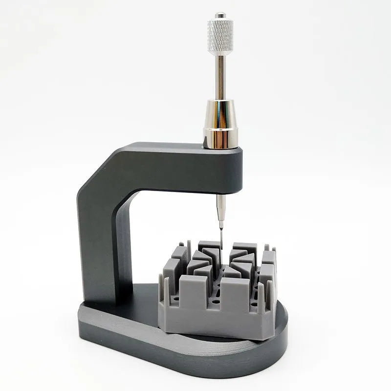 Silver press strap removal tool with precision blade for watch and jewellery repair