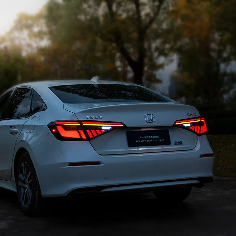 11th generation Honda Civic black and red LED tail light assembly with sequential indicators