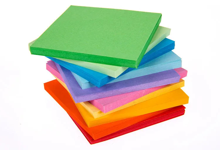 Assorted coloured mini paper scrolls with eyelets in 3x7cm and 7x7cm sizes for drift bottles