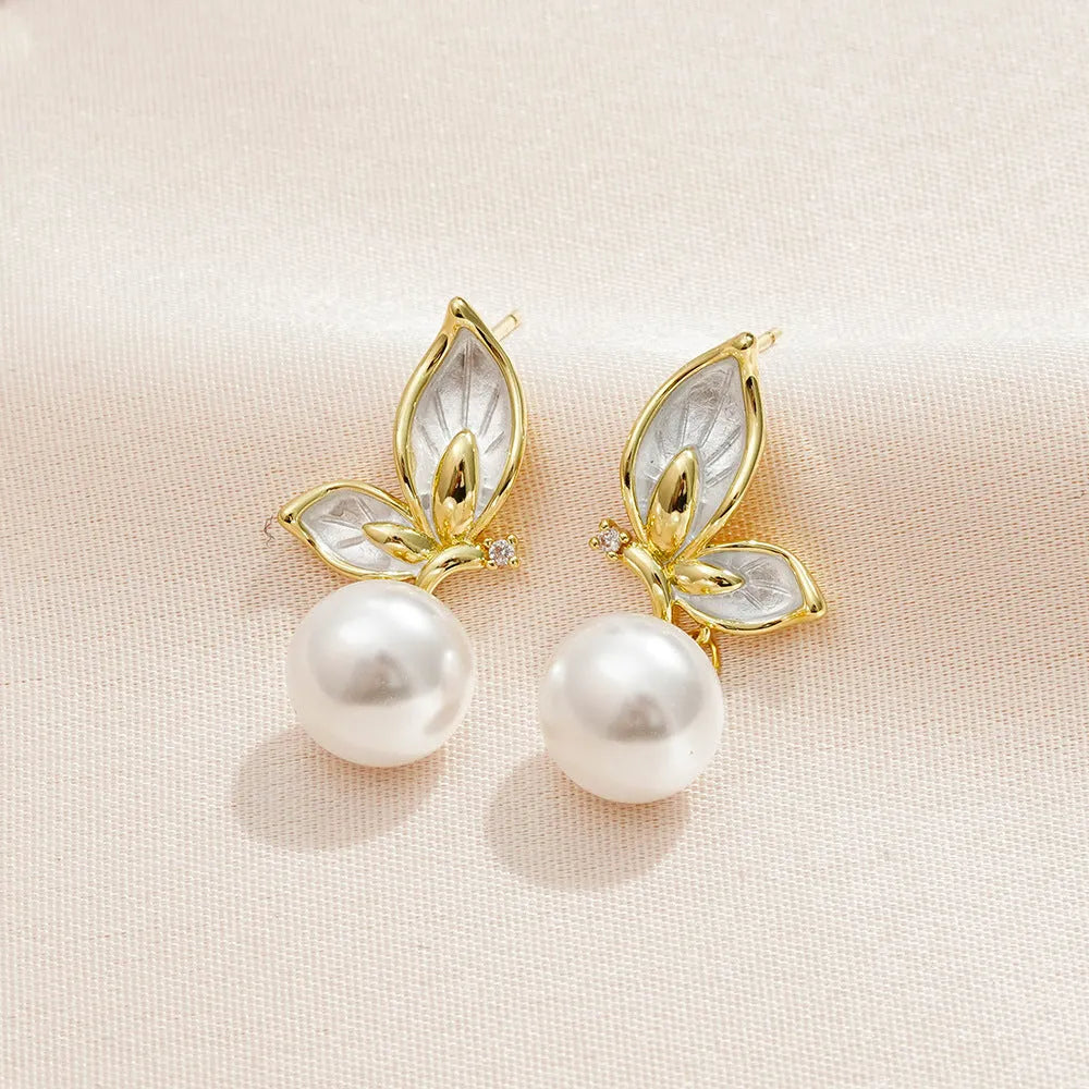 Zircon butterfly earrings for women in electroplated copper with simple geometric design